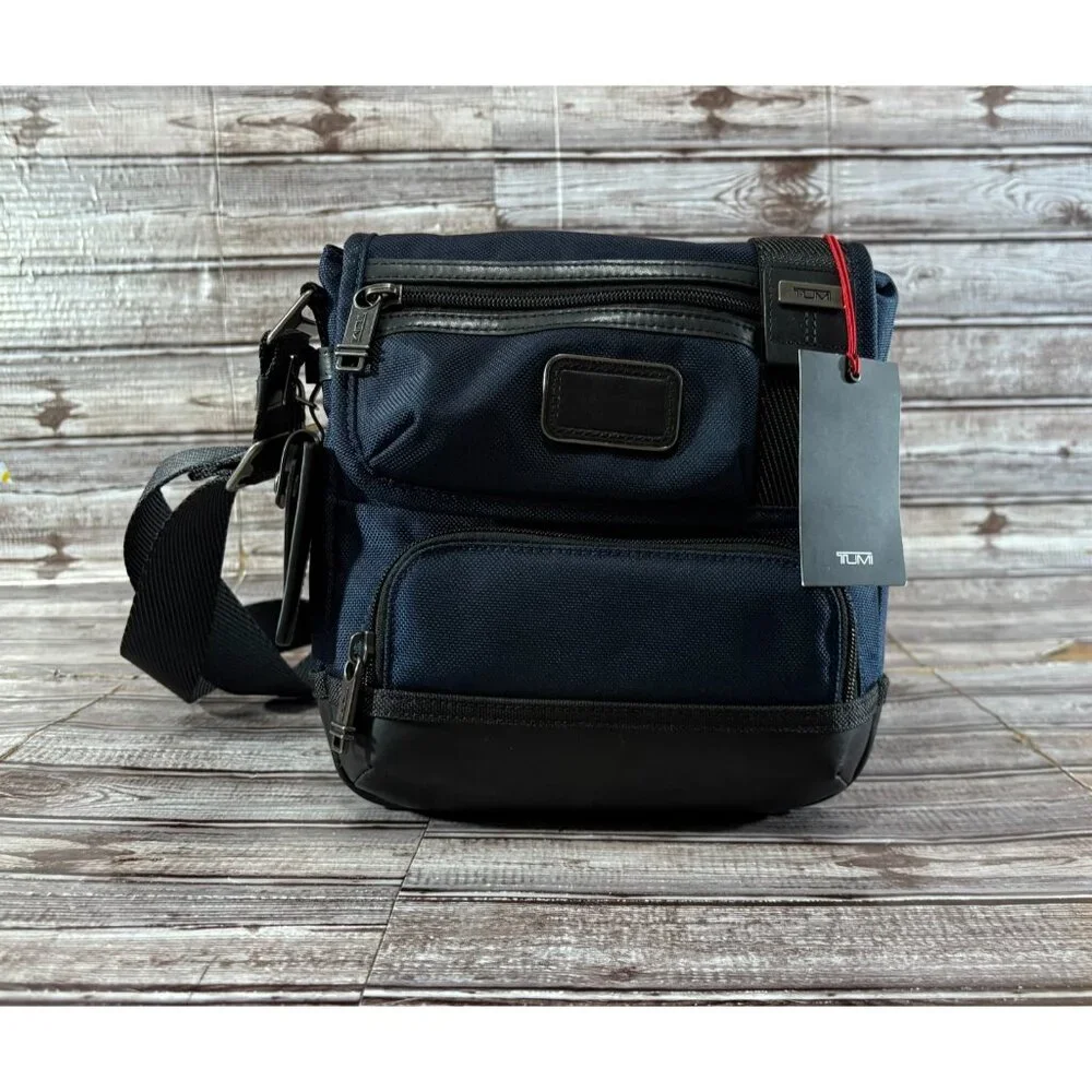 Tumi Fremont KERBY 9.5” Sling Crossbody Bag color NAVY BLUE NWT mspr $295